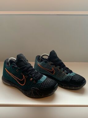Nike Kobe 10 Elite Low "Drill Sergeant" sneakers, featuring a teal Flyknit upper